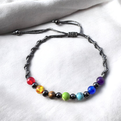 Pulsera trenzada de cuerda multicolor hecha a mano con cuentas de chakras