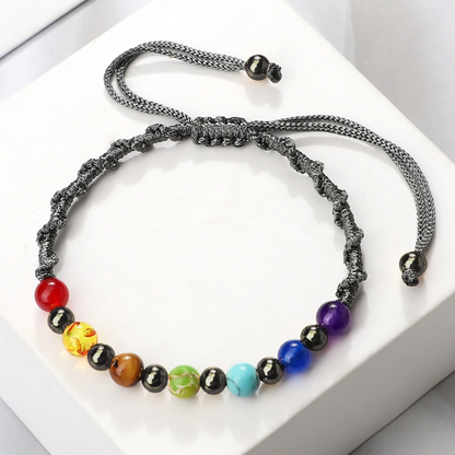 Pulsera trenzada de cuerda multicolor hecha a mano con cuentas de chakras