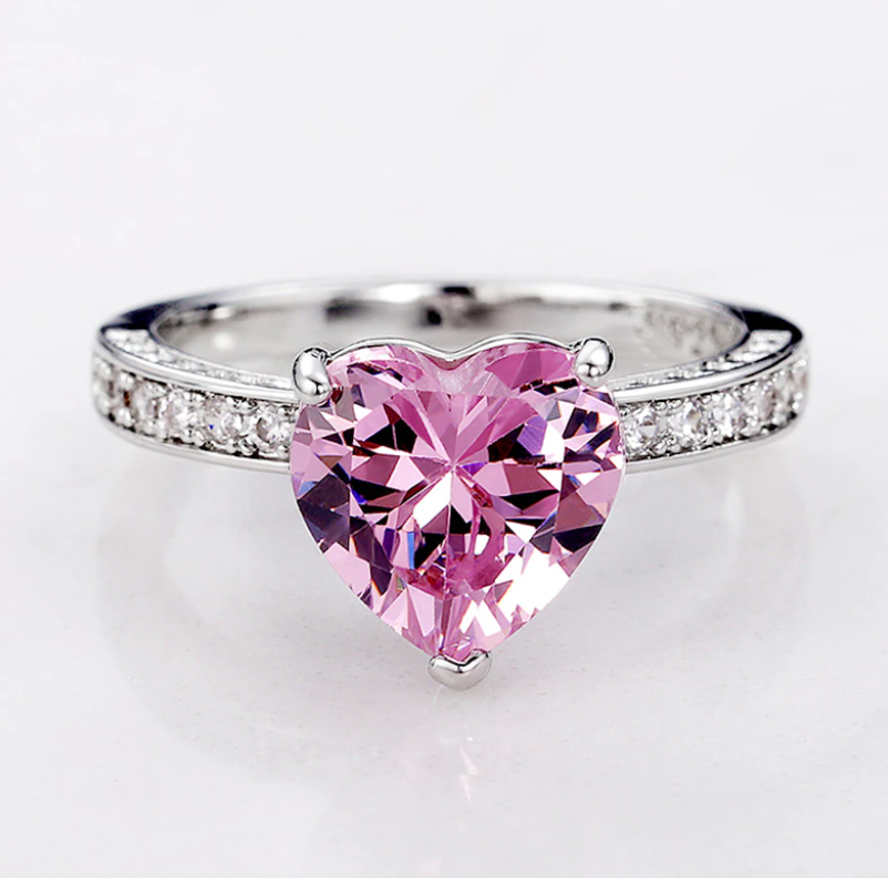 Anillo de compromiso de lujo con corazón rosa