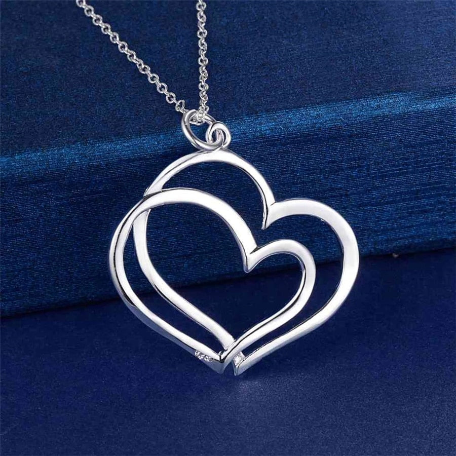 Conjunto de joyas de plata con doble corazón para mujer