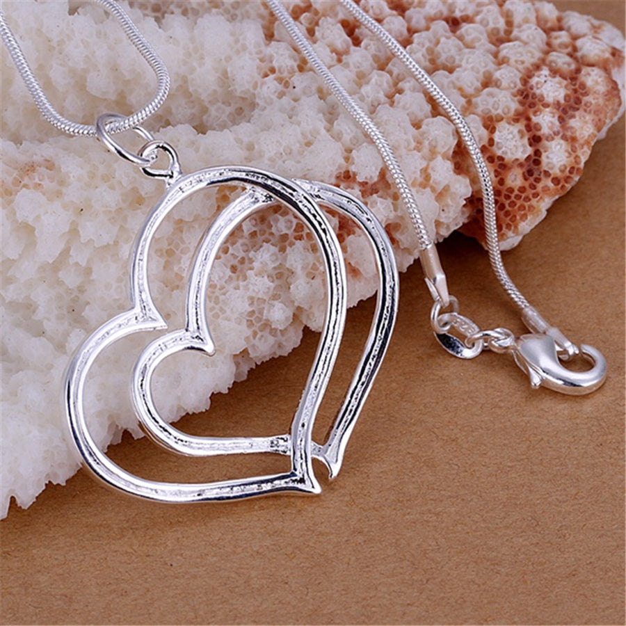 Conjunto de joyas de plata con doble corazón para mujer