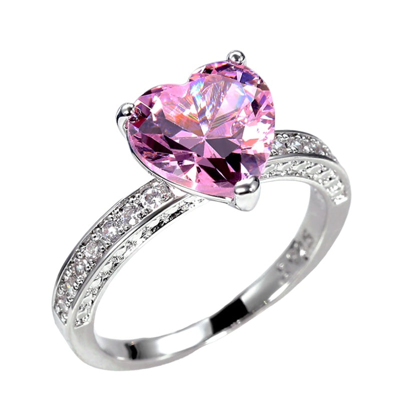 Anillo de compromiso de lujo con corazón rosa